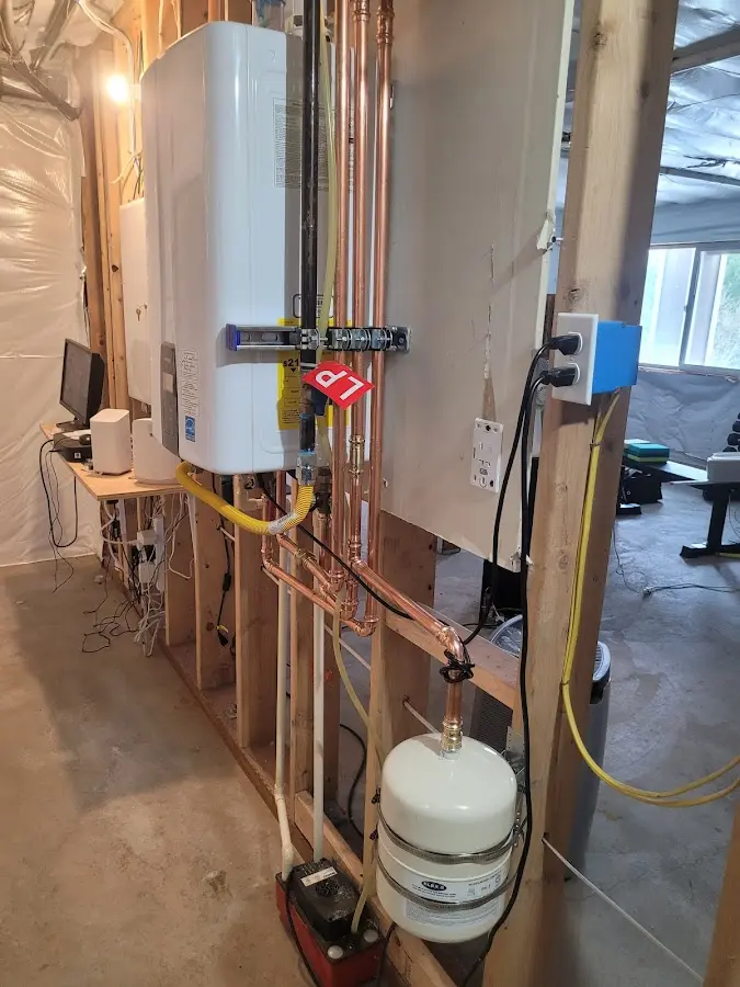 Licensed plumber repairing a kitchen sink in Pleasanton